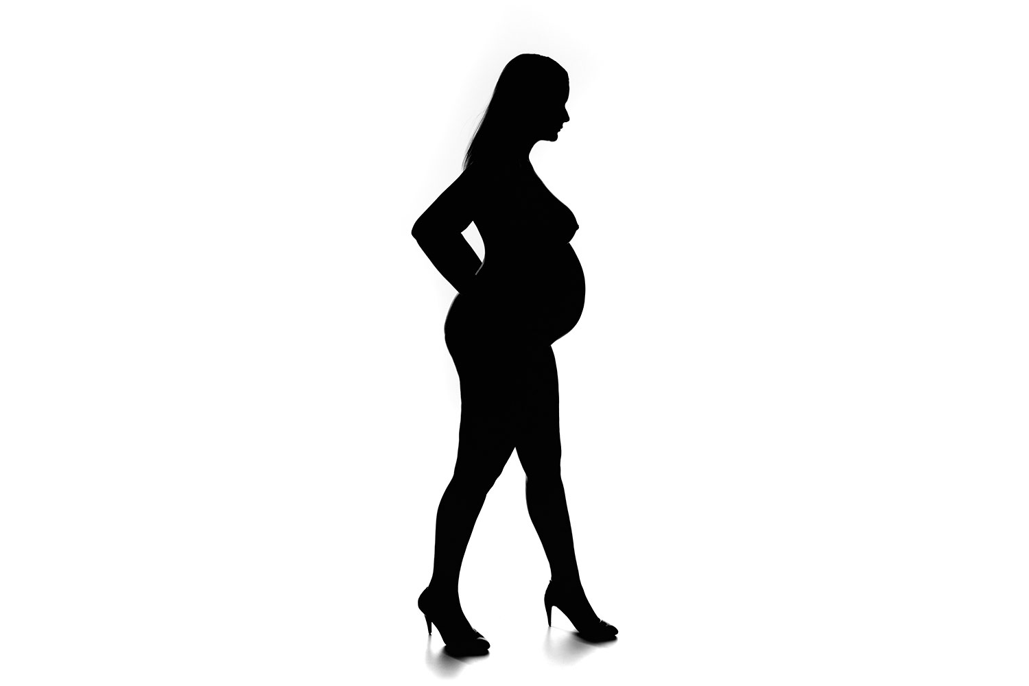 Gravid kvinde i profil - silhouet